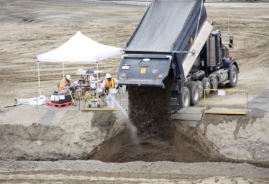 Workers safely dispose of waste at the Environmental Restoration Disposal Facility.